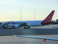 PH-MCI @ EHAM - Martinair - by Chris Hall