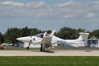 N490TS @ KOSH - DA 42