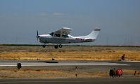 N611WS @ KSQL - 1975 Cessna T210L nears touchdown to RWY 30 - by Steve Nation