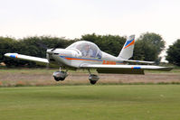 G-WINH @ X5FB - Cosmik EV-97 TeamEurostar UK about to touch down at Fishburn Airfield in August 2010. - by Malcolm Clarke