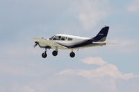 N5738W @ OSH - Arriving at Airventure 2010 - Oshkosh, Wisconsin - by Bob Simmermon