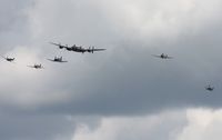 C-GVRA @ YIP - Lancaster in formation with other RAF painted warbirds