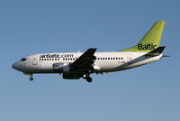YL-BBN @ EBBR - Arrival of flight BT601 to RWY 25L - by Daniel Vanderauwera