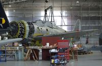 N47DG - Republic (Curtiss) P-47G-10CU (P-47D-5-RE) Thunderbolt being worked on at the Imperial War Museum, Duxford - by Ingo Warnecke
