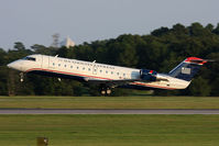 N461AW @ ORF - US Airways Express (Air Wisconsin) N461AW departing RWY 5 en route to Philadelphia Int'l (KPHL) as Flight AWI3581. - by Dean Heald