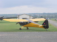 C-FDPV @ D52 - Parked in front of the big hangar at Geneseo. - by Terry L. Swann