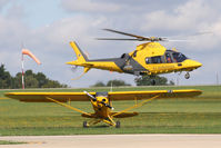 G-MUDY @ EGBK - with the Warwickshire & Northamptonshire Air Ambulance Agusta A109E departing - by Chris Hall