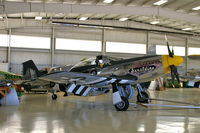 N5500S @ ENW - Parked in the hangar with another P-51, JRFs, J4F - by Glenn E. Chatfield