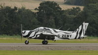 G-ZEBY @ EGSU - G-ZEBY departing IWM Duxford Battle of Britain Air Show Sep. 2010 - by Eric.Fishwick