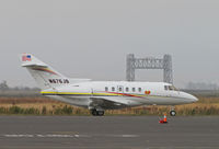 N676JB @ KJAP - Jelly Belly Candy (Fairfield, CA) 2003 Hawker 800XP taxing past Napa River RR bridge on departure for KGPI (Glacier Park Int'l Airport, Kalispell, MT) as TWY676 - by Steve Nation