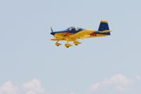 N129RV @ OSH - Landing at Oshkosh, Wisconsin during Airventure 2010 - by Bob Simmermon