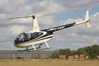 G-OWND @ EGBR - Robinson R44 Astro at Breighton Airfield's Summer Madness All Comers Fly-In in August 2010. - by Malcolm Clarke
