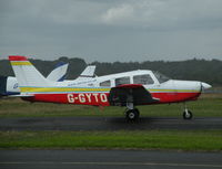 G-GYTO @ EGLK - Tango Oscar taxying past the cafe during a brief shower. - by BIKE PILOT