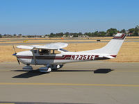 N735XE @ KCCR - Locally-based 1977 Cessna 182Q passing public viewing area on way to RWY1R - by Steve Nation
