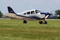 N5738W @ OSH - Departing Airventure 2010 - Oshkosh, Wisconsin - by Bob Simmermon