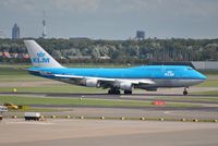 PH-BFR @ EHAM - KLM heavy rolling on departure to Rio - by Robert Kearney