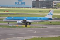 PH-EZB @ EHAM - KLM cityhopper taxiing for departure - by Robert Kearney