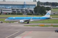 PH-EZD @ EHAM - KLM cityhopper on tow - by Robert Kearney