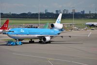 PH-KCF @ EHAM - KLM heavy on push-back - by Robert Kearney