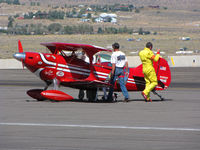 N49310 @ KRTS - Race # 711 1982 Aerotek PITTS SPECIAL S-1S after competing in morning heat in Biplane Class @ 2009 Reno Air Races - one happy pilot? - by Steve Nation