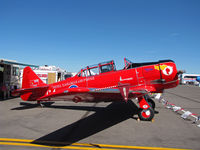CF-WLO @ KRTS - Race #64 is a CCF Harvard Mk. IV in Royal Canadian Air Force Red Knights colors being readied for T-6 Class racing @ 2009 Reno Air Races - by Steve Nation