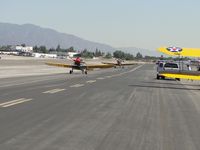 N46234 @ CCB - N46234 and N56026 taxiing to hangers - by Helicopterfriend