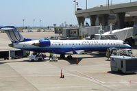 N740SK @ DFW - United Express at the gate - DFW Airport, TX