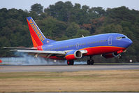 N314SW @ ORF - Southwest Airlines N314SW landing RWY 23. - by Dean Heald