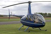 G-EVEV @ EGBR - Robinson R44 Raven ll at Breighton Airfield during the September 2010 Helicopter Fly-In. - by Malcolm Clarke