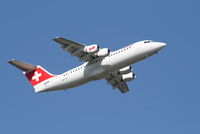 HB-IXX @ EBBR - Flight LX779 is taking off from RWY 07R - by Daniel Vanderauwera