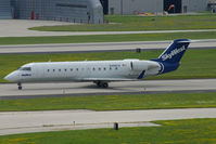 N498CA @ KMKE - Skywest CRJ 200 seen taxiing at MKE. - by Joe Walker