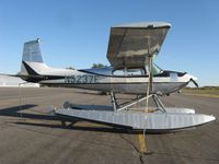 N5237E @ KAXN - Cessna 180B Skywagon on the ramp, now complete with floats. - by Kreg Anderson