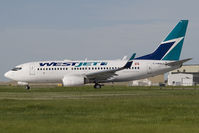 C-FMWJ @ CYYC - Westjet 737-700 - by Andy Graf-VAP