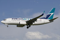 C-FTWJ @ CYYC - Westjet 737-700 - by Andy Graf-VAP