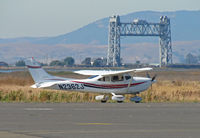 N2362J @ KAPC - 1999 Cessna 182S taxis for take-off with Napa River RR bridge in background - by Steve Nation