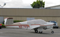 N9785R @ KHWD - Groveland, CA-based 1960 Beech M35 (tip tanks and canopy covered) visiting Hayward, CA - by Steve Nation