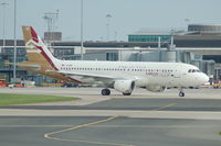 TS-IND @ EGCC - Libyan Airlines Airbus A320-212 taxiing at Manchester Airport - by David Burrell