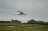 G-JWDB @ EGFH - Landing Runway 28 - by Roger Winser