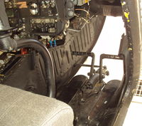 68-16864 @ ALO - Here's the lower portion of the pilot's station.  The pedals have not been replaced and show much wear.  I've got a lot of hours in this cockpit and lots of fond memories. - by Bookie