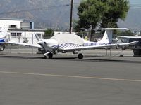 N804ER @ POC - Covered and parked in transient parking - by Helicopterfriend
