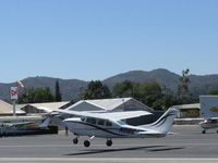 N6834R @ SZP - 1966 Cessna T210G TURBO CENTURION, Continental TSIO-520-C 285 Hp, liftoff  Rwy 22 - by Doug Robertson