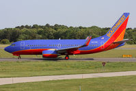 N407WN @ ORF - Southwest Airlines N407WN (FLT SWA2388) taxiing to RWY 23 via Taxiway Charlie for departure to Tampa Int'l (KTPA). - by Dean Heald