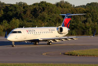 N8696C @ ORF - Delta Connection (Pinnacle Airlines) N8696C (FLT FLG3949) exiting RWY 5 at Taxiway Golf after arrival from New York LaGuardia Airport (KLGA). - by Dean Heald