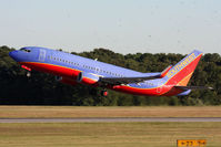 N617SW @ ORF - Southwest Airlines N617SW (FLT SWA889) departing RWY 5 en route to Jacksonville Int'l (KJAX) during an invasion of sea gulls. Airport Ops personnel were using fireworks to scare off the birds. - by Dean Heald