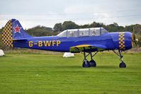 G-BWFP @ EGCB - 1985 Intreprinderea De Avioane Bacau YAK-52, c/n: 855503 at Barton - by Terry Fletcher