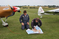 G-RIOT @ X5FB - Silence Twister. Pilots of G-RIOT & G-TWST doing some ground level flight planning at Fishburn Airfield, October 2010. - by Malcolm Clarke