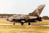 ZA598 @ EGQS - Tornado GR.1B of 617 Squadron awaiting clearance to join Runway 05 at RAF Lossiemouth in the Summer of 1995. - by Peter Nicholson