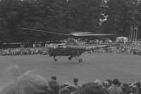 WG752 - Off airport. Fleet Air Arm Dragonfly HR.3 helicopter coded 561 of 727 NAS's ASR Flight  based at RNAS Brawdy (HMS Goldcrest), Pembrokeshire seen during a rescue demonstration in Singleton Park, Swansea, Wales, UK circa 1959. - by Roger Winser