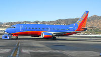 N608SW @ KBUR - Southwest 1995 737-3H4 pushing back from gate at Bob Hope Airport - by Steve Nation