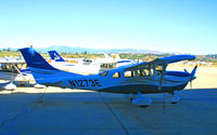 N1273E @ KCMA - 2006 Cessna T206H on hangar at Camarillo Airport, CA home base on balmy, sunny January 2007 picture postcard day (experienced landing accident at Grand Canyon NP Airport, CO on April 28,2007; re-registered N127JE)) - by Steve Nation